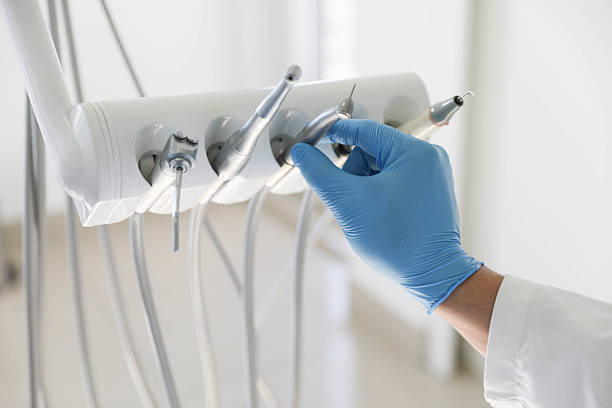 Professional Emergency Dentist technician working in Stanton, CA